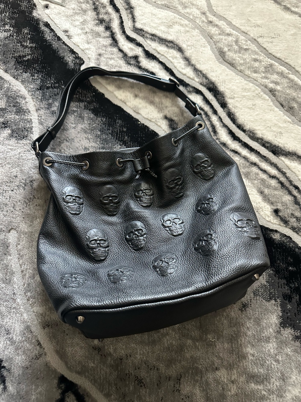 iOpelle Black Leather Shoulder Bag with Embossed Skull Detail